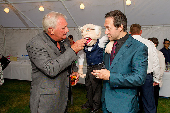 Actor Graham Cole OBE with ventriloquist Steve Hewlett at a charity event